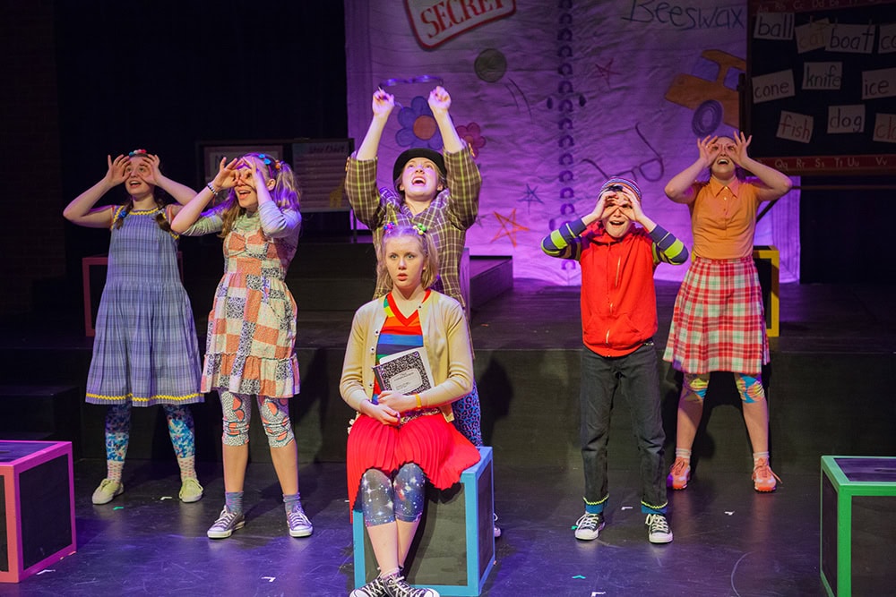 Students performing in a theater production